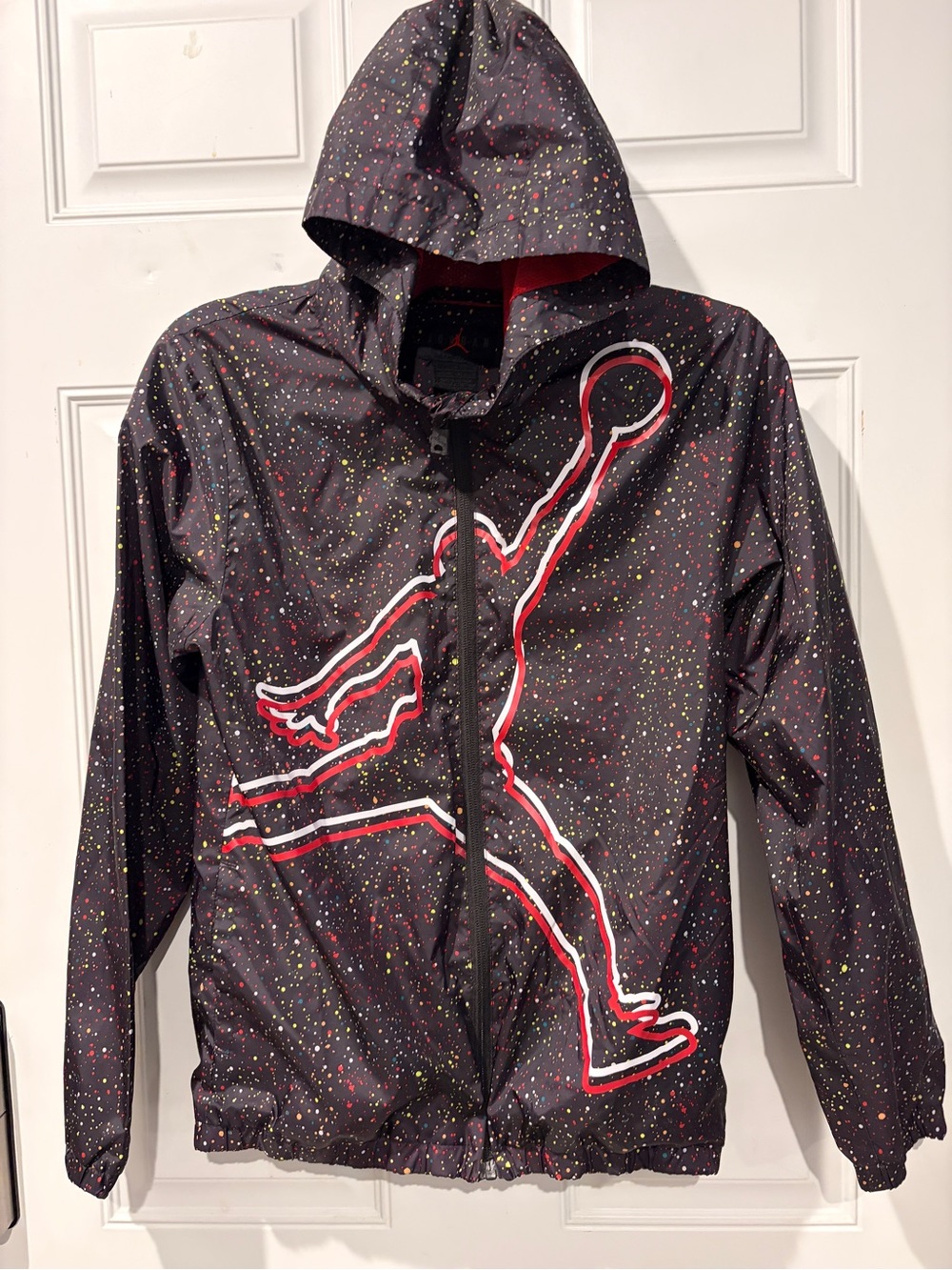 Youth size L. Jordan Jumpman hooded Windbreaker/Rain Jacket.